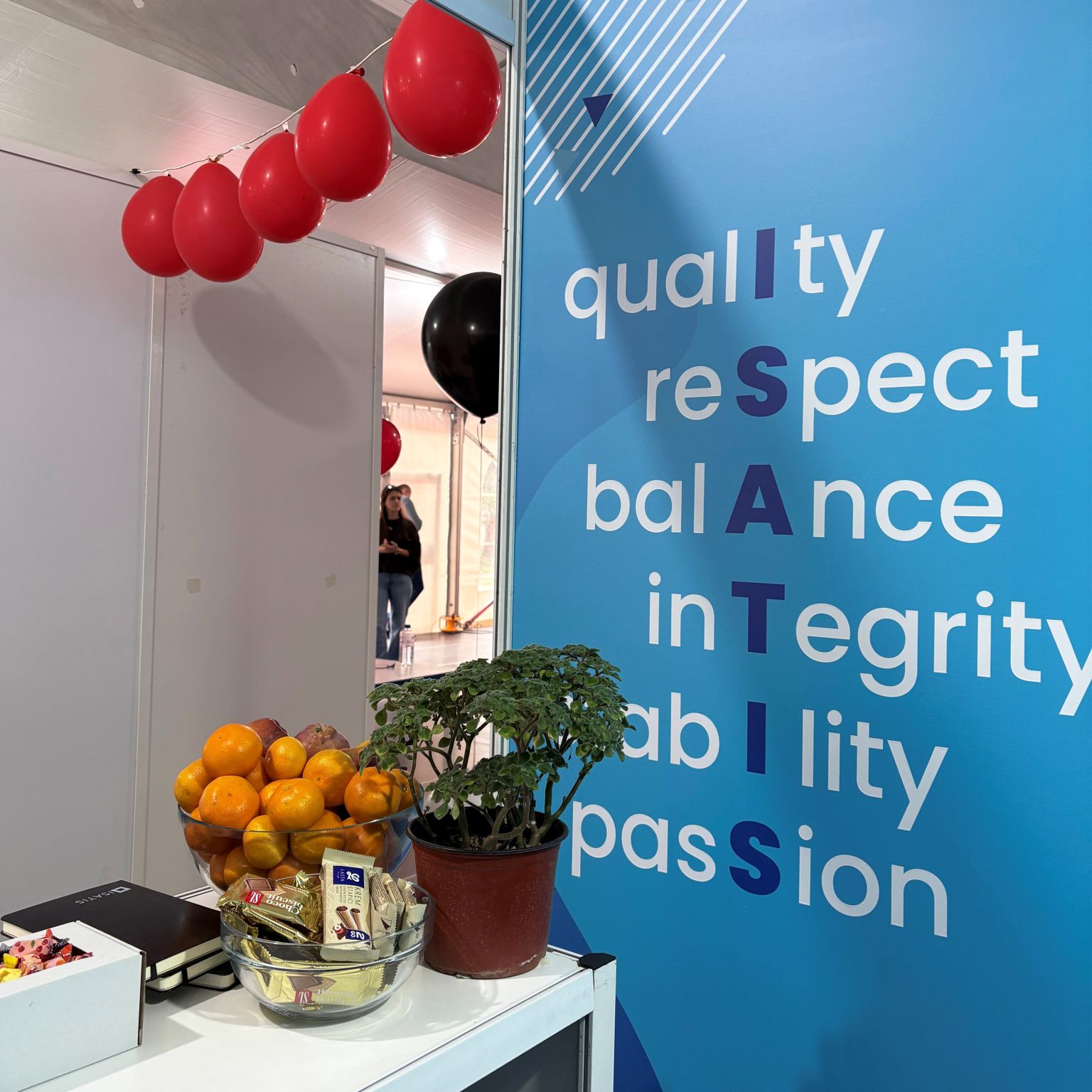 Isatis booth at event showcasing company values